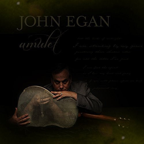the album cover for John Egan - Amulet