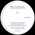 the album cover for Crystal Ark - The City Never Sleeps
