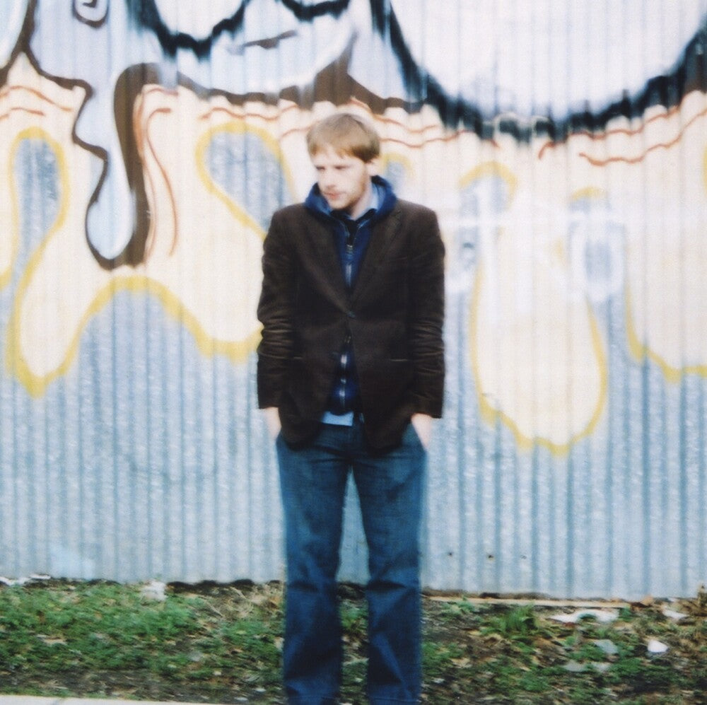 the album cover for Kevin Devine - Split The Country Split The Street [Reissue]