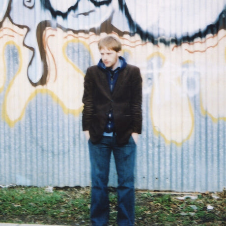 the album cover for Kevin Devine - Split The Country Split The Street [Reissue]