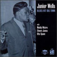 the album cover for Junior Wells - Blues Hit Big Town