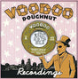 the album cover for Deep Fried Boogie Band - Doughnut Make My Brown Eyes Blue / Tokyo Cowboy