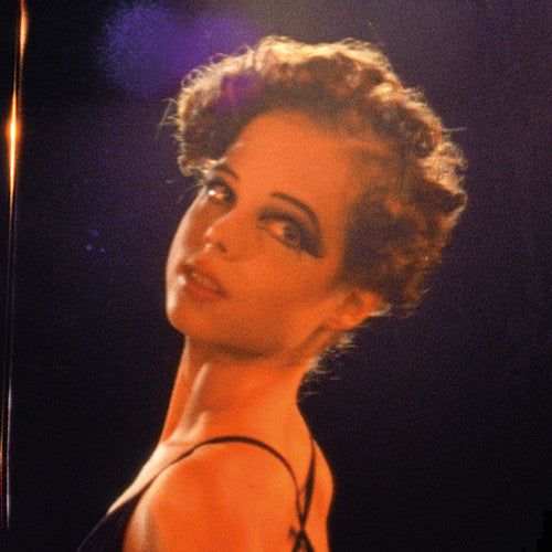 the album cover for Delia Gonzalez - In Remembrance [Limited Edition Purple Vinyl w/DVD]