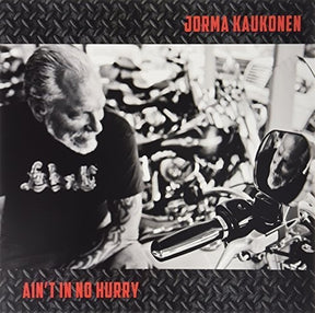 the album cover for Jorma Kaukonen - Ain't in No Hurry
