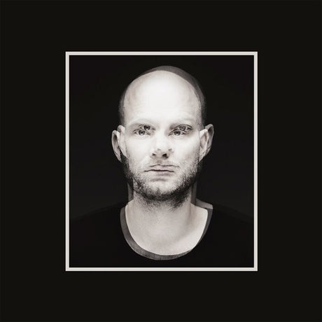 the album cover for Tomas Barford - Love Me [Clear Vinyl]