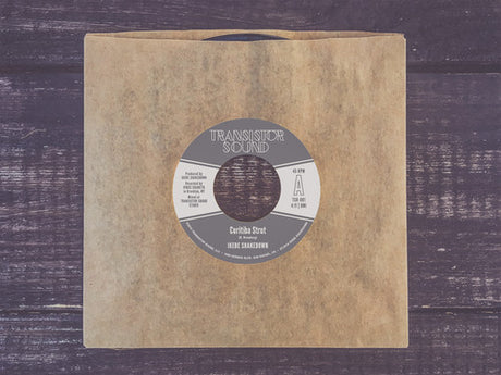 the album cover for Ikebe Shakedown - Curitiba Strut / Hanging On [Vinyl Single]