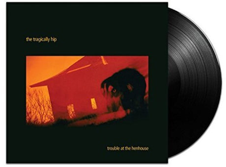 the album cover for The Tragically Hip - Trouble At The Henhous