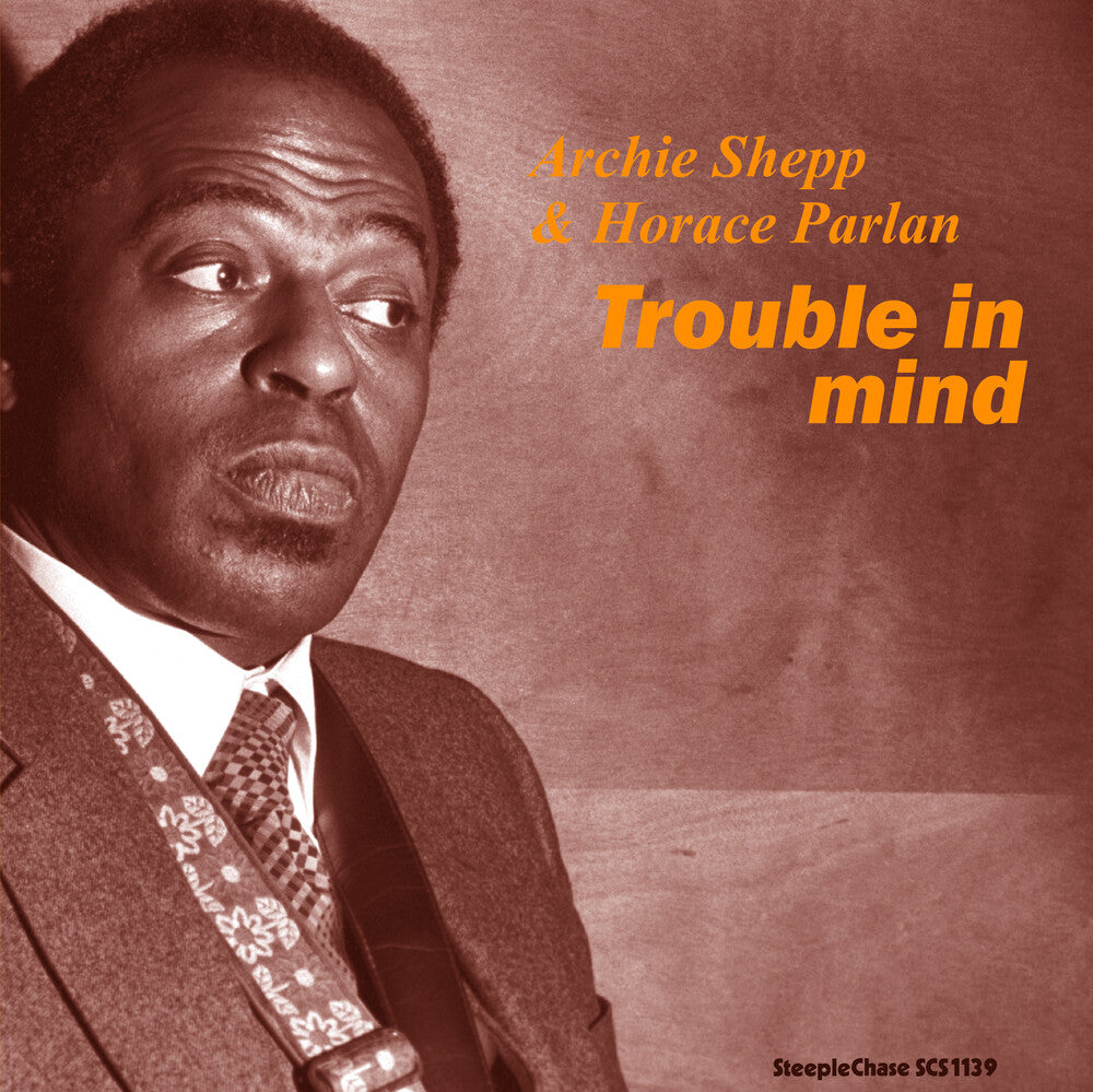 the album cover for Archie Shepp - Trouble In Mind
