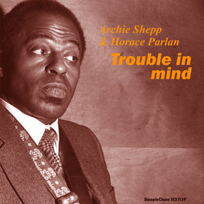 the album cover for Archie Shepp - Trouble In Mind
