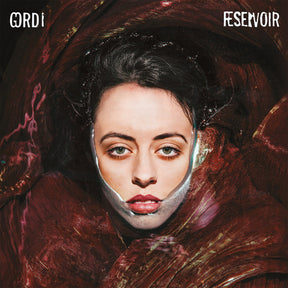 the album cover for Gordi - Reservoir [Magenta Marbled LP]