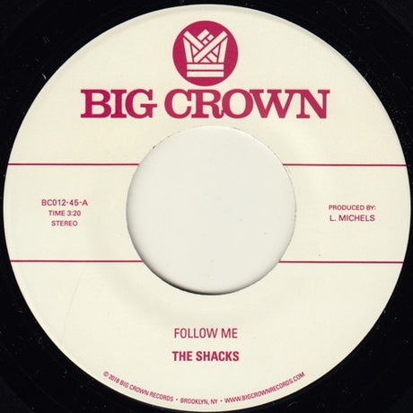 the album cover for The Shacks - Follow Me / Texas [Vinyl Single]