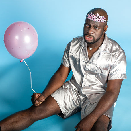 the album cover for Nnamdi - Brat [Blue LP]