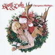 the album cover for Kenny Rogers & Dolly Parton - Once Upon A Christmas [LP]