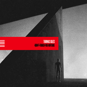 the album cover for Thomas Giles - Don't Touch The Outside (solid White)