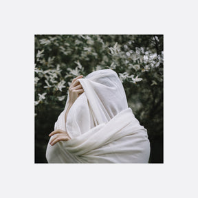 the album cover for Zola Menneoh - Longing For Belonging