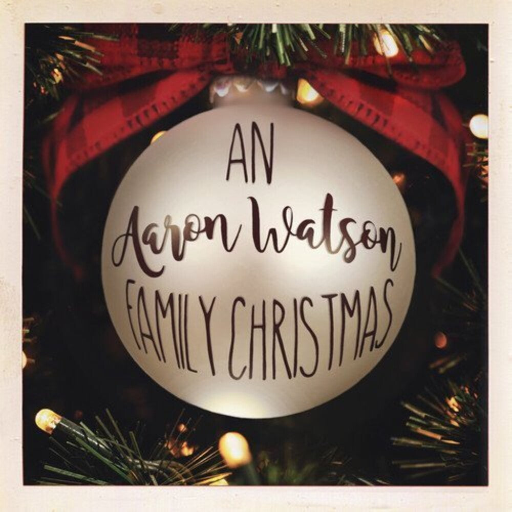 the album cover for Aaron Watson - An Aaron Watson Family Christmas: Re-Wrapped (Grn)