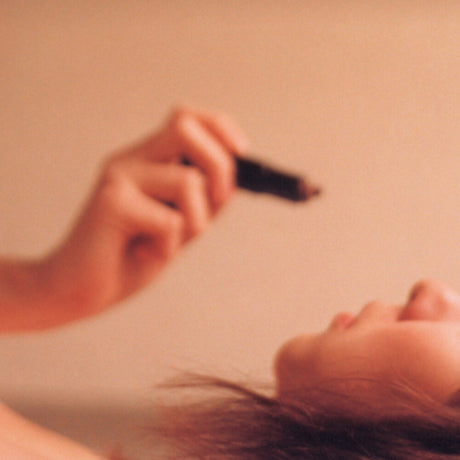 the album cover for These Arms Are Snakes - Oxeneers Or The Lion Sleeps When Its Antelope Go Home [LP]