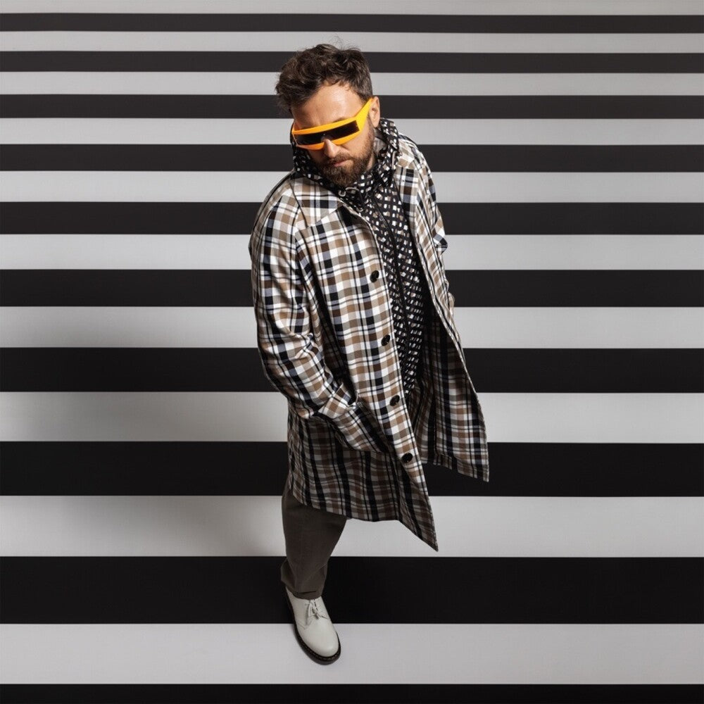 the album cover for Dargen D'Amico - Nei Sogni Nessuno E Monogamo