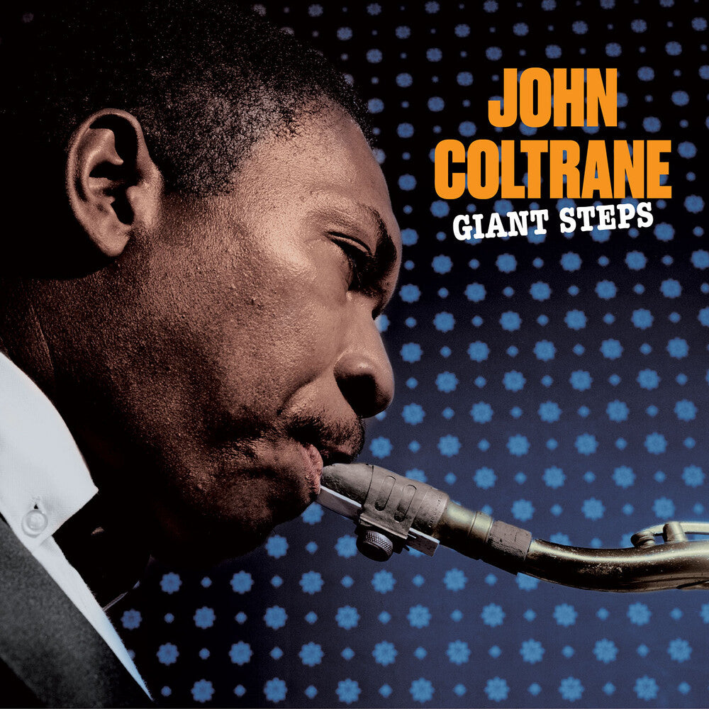 the album cover for John Coltrane - Giant Steps - 180-Gram Solid Blue Colored Vinyl With Bonus Track