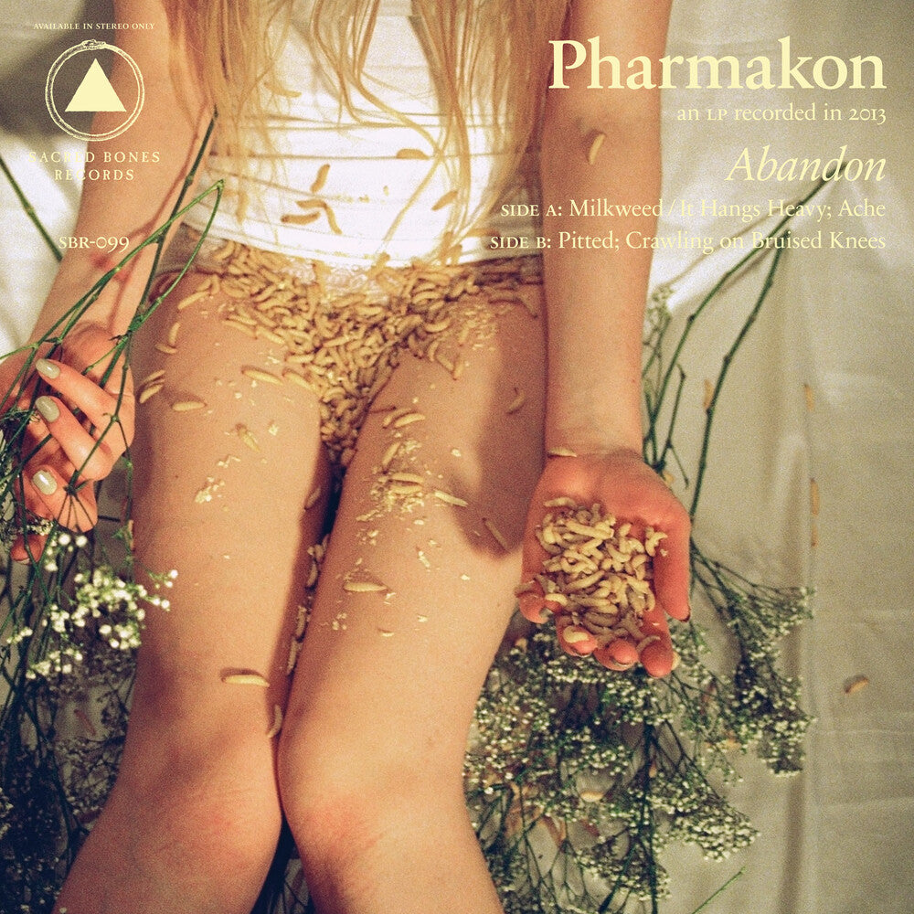 the album cover for Pharmakon - Abandon: SB 15 Year Edition [Black White & Orange Starburst LP]