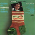 the album cover for Buck Owens & His Buckaroos - Christmas With Buck Owens And His Buckaroos