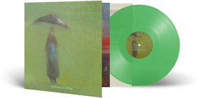 the album cover for Sol Invictus - In The Rain - Light Green Transparent [Colored Vinyl] (Grn)