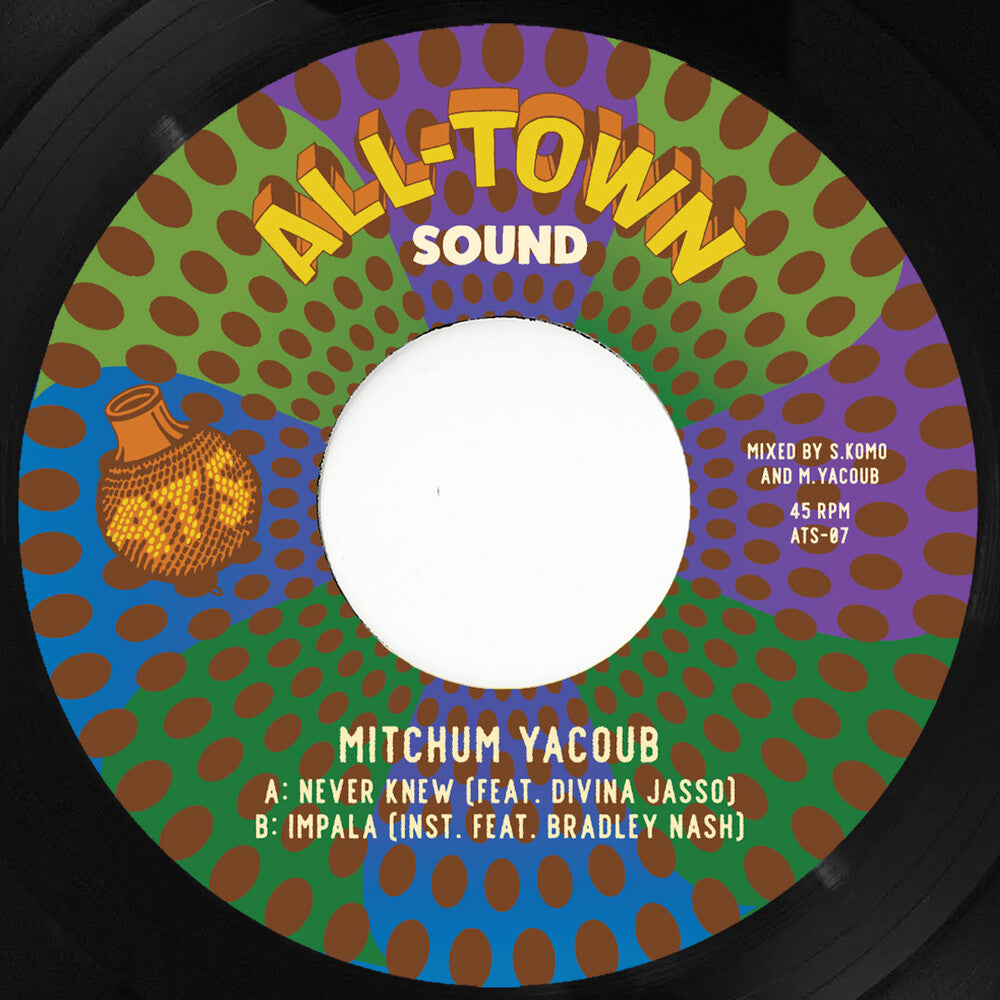 the album cover for Mitchum Yacoub - Never Knew - White [Colored Vinyl] (Wht)