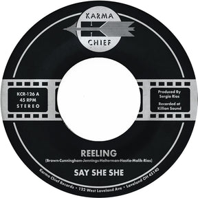 the album cover for Say She She - Reeling / Don't You Dare Stop