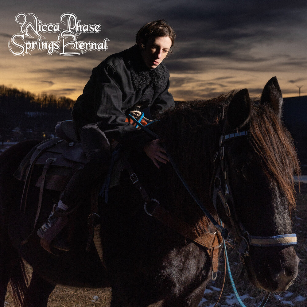 the album cover for Wicca Phase Springs Eternal - Wicca Phase Springs Eternal [Cloudy Clear w/Black Splatter LP]