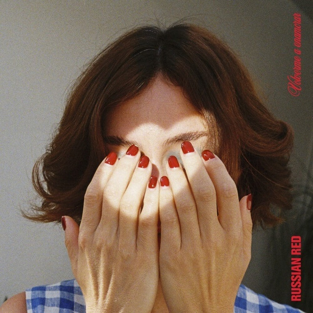 the album cover for Russian Red - Volverme A Enamorar (Spa)