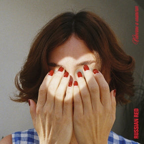 the album cover for Russian Red - Volverme A Enamorar (Spa)