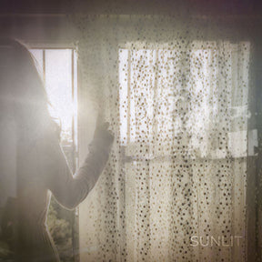 the album cover for Sunlit - Sunlit