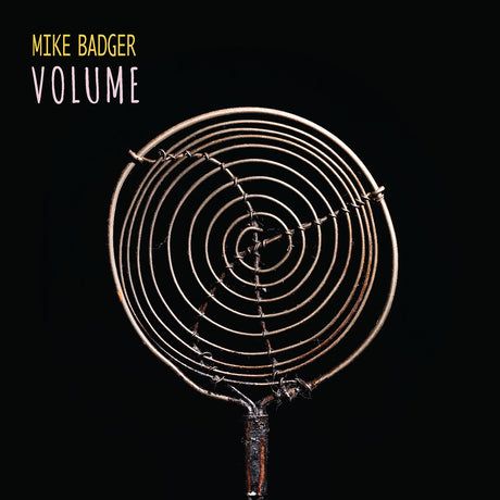 the album cover for Mike Badger - Volume [Limited Edition]