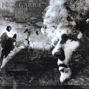 the album cover for Nick Garrie - Nightmare Of J.B. Stanislas B/W Around The World