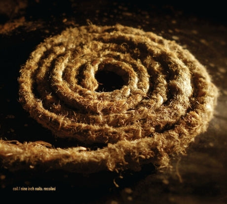 the album cover for Coil / Nine Inch Nails - Recoiled