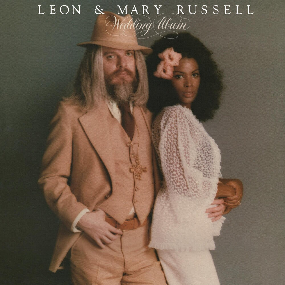 the album cover for Leon Russell - Wedding Album [Clear Vinyl] (Gol) [Limited Edition]