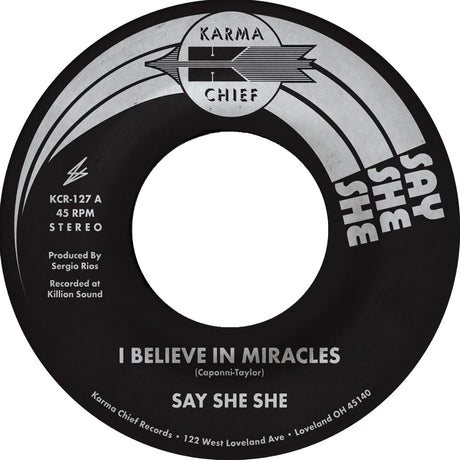 the album cover for Say She She - I Believe In Miracles / C'est Si Bon