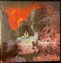 the album cover for Earth - Primitive And Deadly