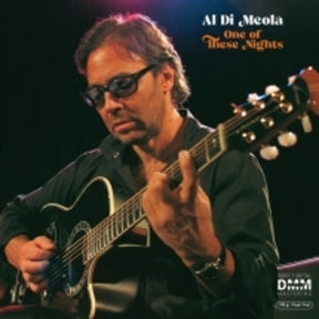 the album cover for Al Di'meola - One Of These Nights
