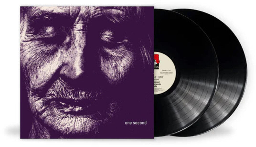 the album cover for Paradise Lost - One Second (Uk)