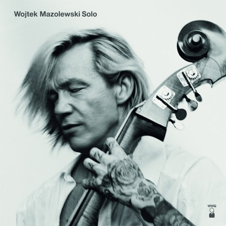 the album cover for Wojtek Mazolewski - Solo