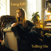 the album cover for Lucy Kitt - Telling Me
