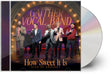 the album cover for Gaither Vocal Band - How Sweet It Is: Live In Concert