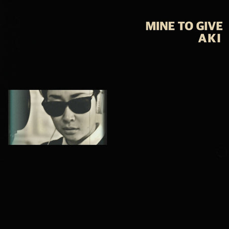 the album cover for Aki - Mind To Give