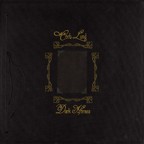 the album cover for Corb Lund - Dark Horses