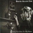the album cover for David Allan Coe - Standing Too Close To the Flame