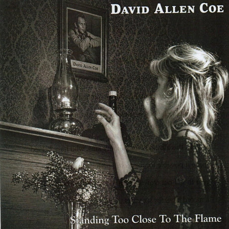 the album cover for David Allan Coe - Standing Too Close To the Flame