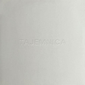 the album cover for Spalarnia - Tajemnica