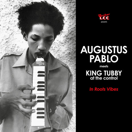 the album cover for Augustus Pablo - In Roots Vibes [Colored Vinyl] [Deluxe] [Limited Edition] (Ofgv) (Red)