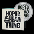 the album cover for Joy Oladokun - Hope Is A Heavy Thing